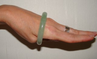 put on tight jade bangle